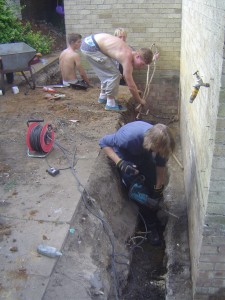 Drilling holes for the steel reinforcing bars